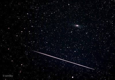 [Meteor over M31.]